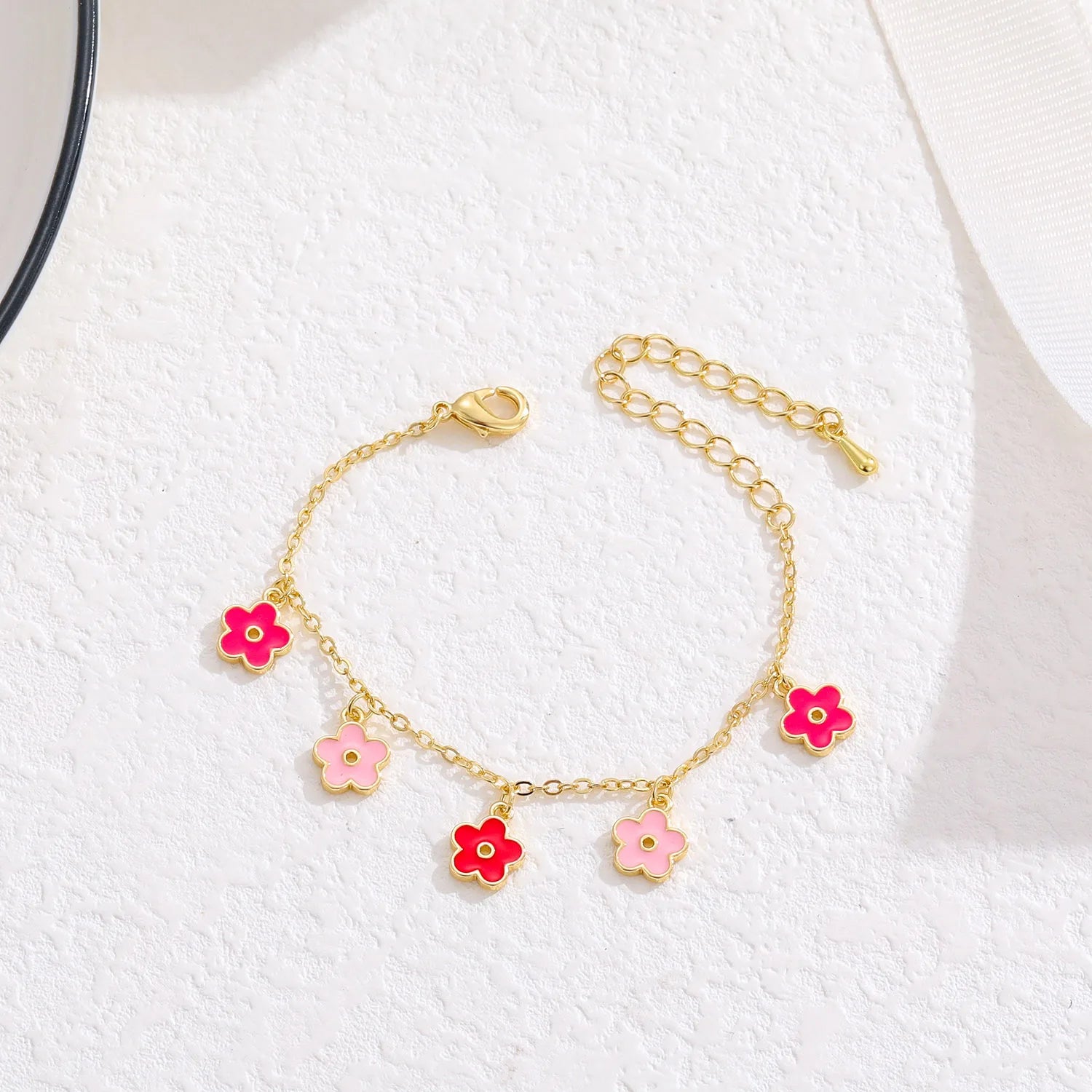 Enchanting Five Flowers Charm Bracelet: The Perfect Gift for Your Little Princess's Best Friend!