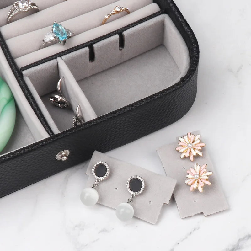 Travel in Style: Portable Button Leather Jewelry Storage Box!