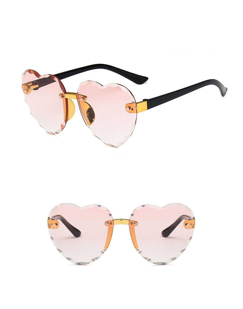 Lovely Sunshine Style: Heart Shaped Rimless Kids Sunglasses - A Must-Have for Summer Outings with UV400 Protection!