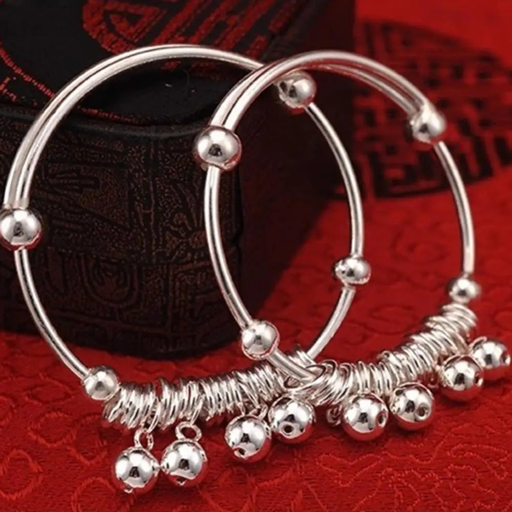 Adorable 2-Piece Silver Bangle Bracelet Set with Bells: Perfect Fashion Jewelry for Children's Birthday Gifts!