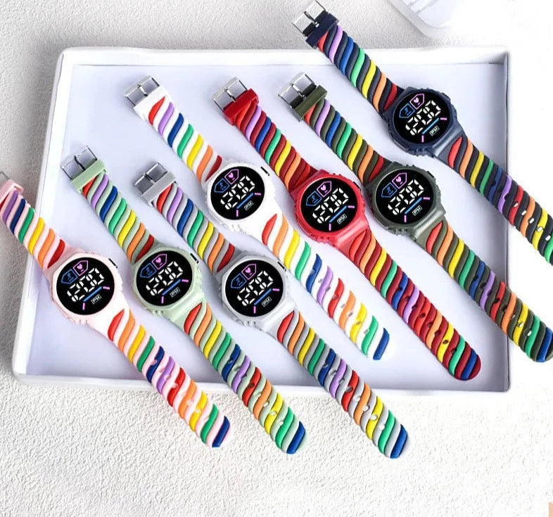 Radiant Rainbows: Kids LED Watch - Vibrant Rainbow Silicone Strap, Waterproof Sports Digital Timepiece for Boys and Girls!