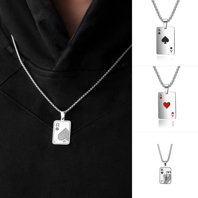 A silver-toned necklace with a rectangular playing-card pendant is shown worn on a person's neck over a black hoodie, alongside three smaller product views on the right showing different card designs: black ace of spades, red ace of hearts, and king of clubs.