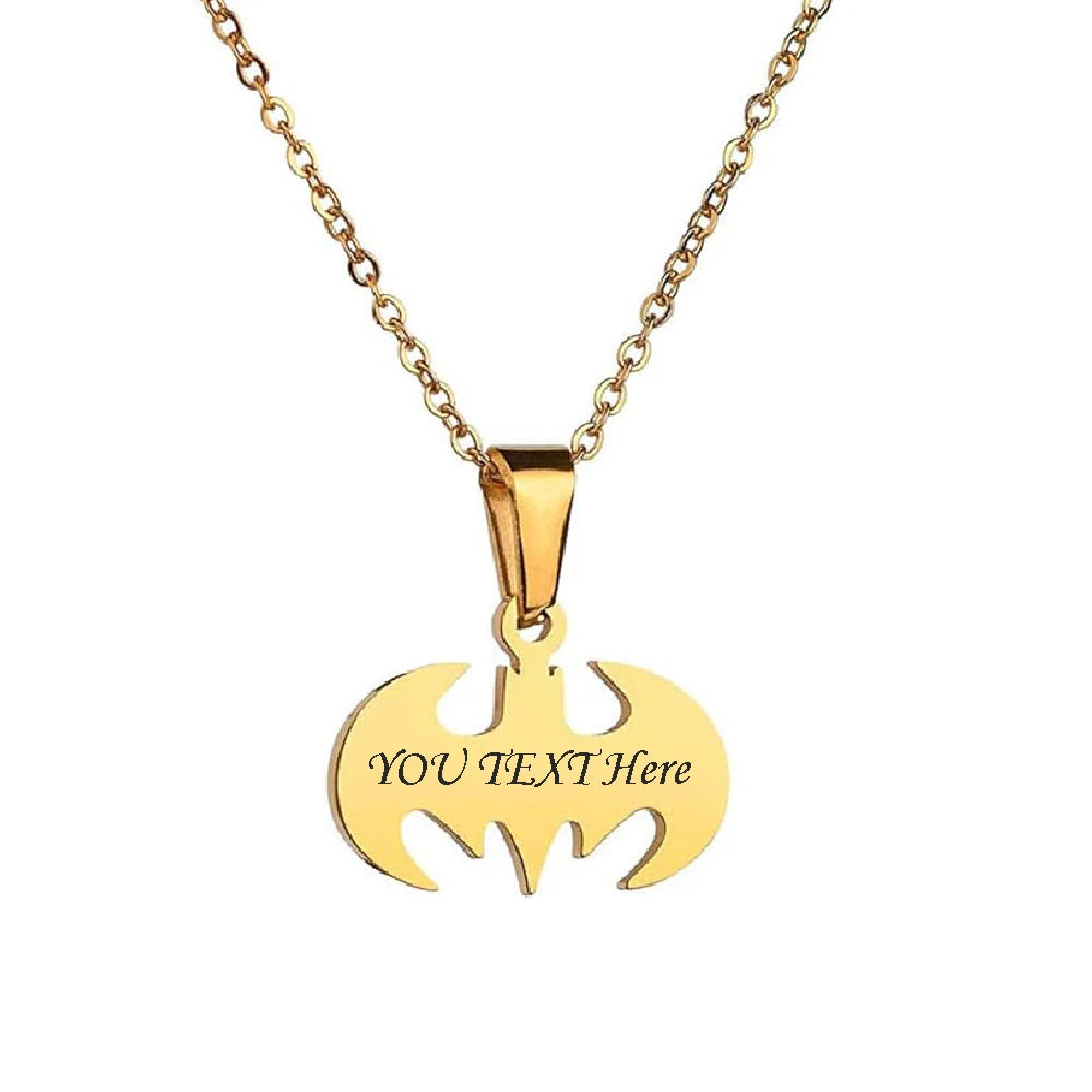 Gold bat-shaped pendant necklace with 'YOU TEXT HERE' text on a white background