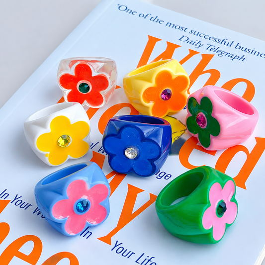 Collection of colourful acrylic fashion rings for girls and teens