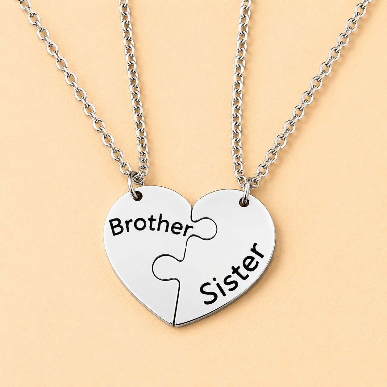 Matching sibling necklace set designed for brothers and sisters to symbolize family connection.