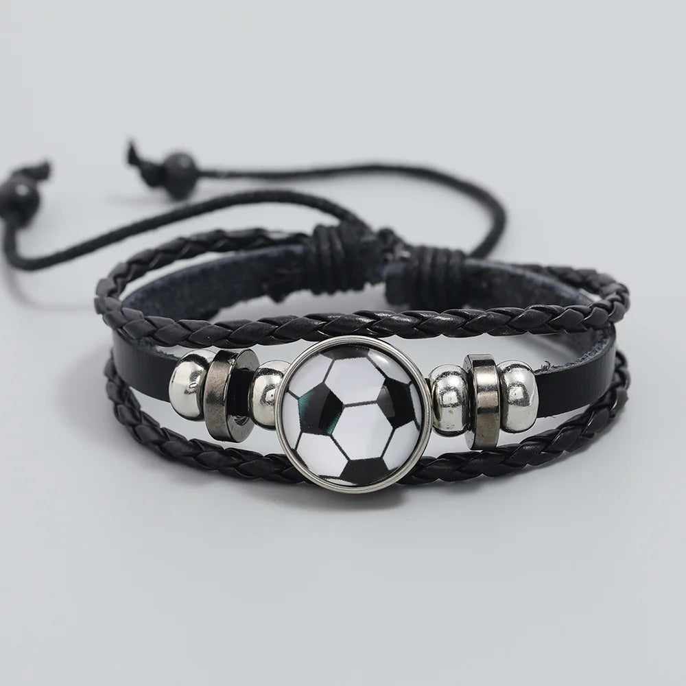 Teen boy wearing adjustable leather football bracelet.