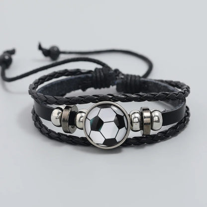 Teen boy wearing adjustable leather football bracelet.