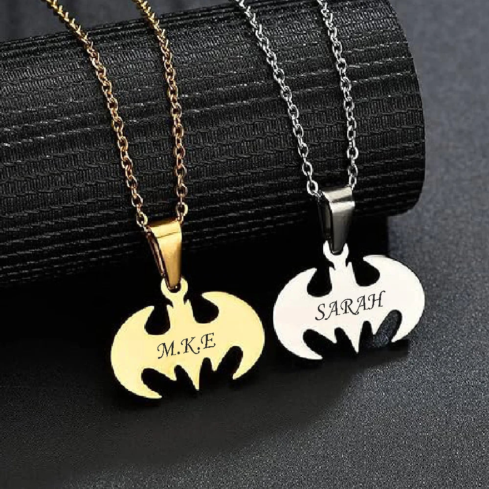 Superhero-inspired bat necklace with polished stainless steel finish.
