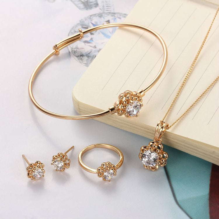 Radiate Elegance: Twinkling Petal Jewelry Set - 18k Gold Plated with CZ Stones for a Sparkling Birthday Present!