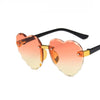 Lovely Sunshine Style: Heart Shaped Rimless Kids Sunglasses - A Must-Have for Summer Outings with UV400 Protection!