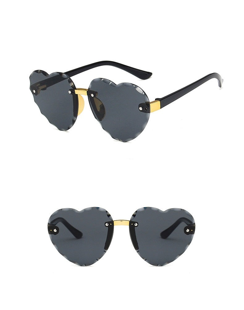 Lovely Heart-Shaped Rimless Sunglasses: Fashionable Sun Protection for Kids on Outdoor Adventures!
